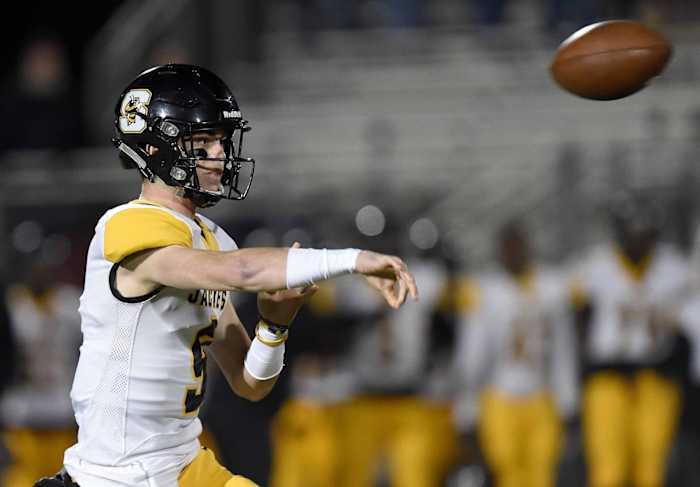 Starkville quarterback Luke Altmyer (9) throws over the middle against Clinton on Friday, November 2, 2018, at Clinton High School in Clinton, Miss.11 02 Clinton Starkville 009